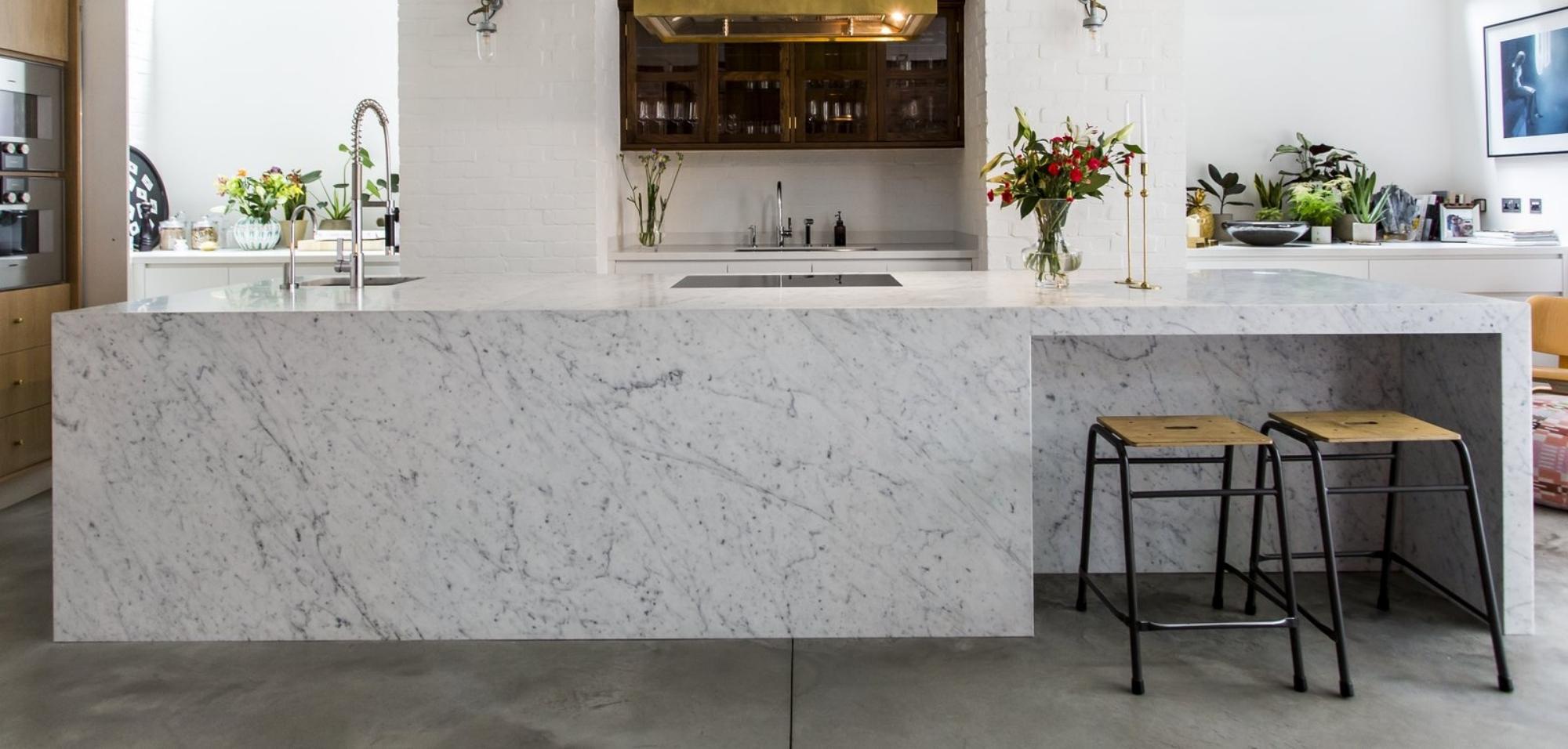 Carrera White Marble Kitchen Countertops and Island with Waterfall Panel Front
